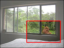 You can see from the height of the bed that this second storey windowsill is a safety risk.